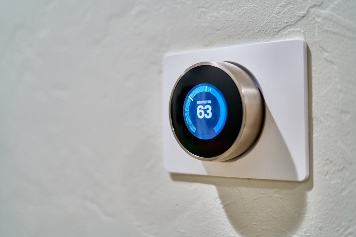 Smart heating thermostat on a wall